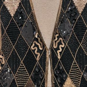 Elegant sequence vest with gold turtleneck
